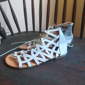 Light blue gladiator-style sandals